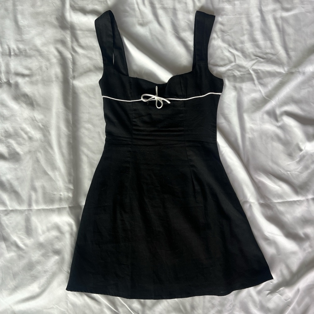 Elegant Black Dress with White Accent